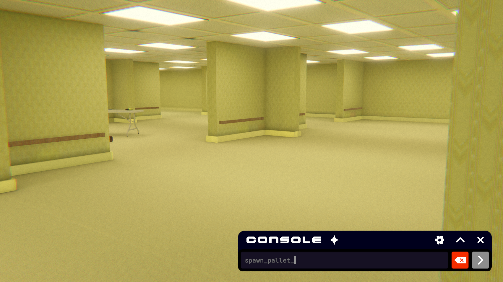 The console collapsed to its entry bar with a spawn command part-typed.